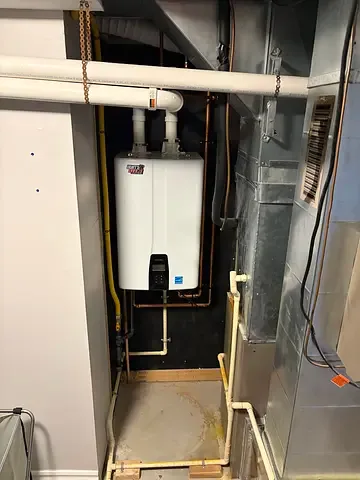 Tankless hot water system piping installed by Burt’s Breeze